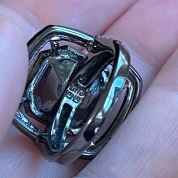 Givenchy Red Crystal
Ring in gunmetal setting. Size 6.75 - Picture 10 of 11
